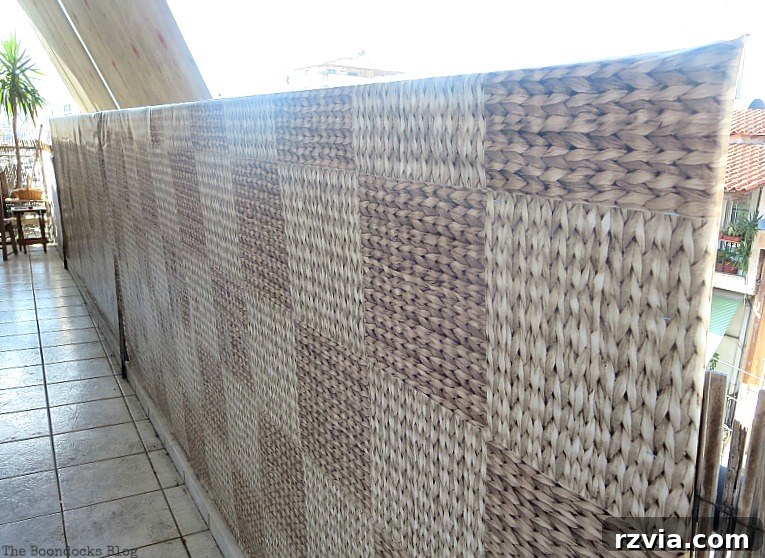 Installation of additional plywood screens covered in vinyl, creating a more enclosed and private outdoor room on the balcony. Adding Two More Screens, Part 1 www.theboondocksblog.com