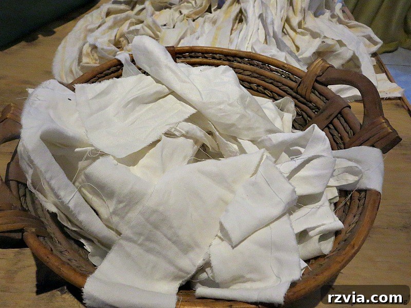 Fabric scraps cut into strips, ready for crafting.