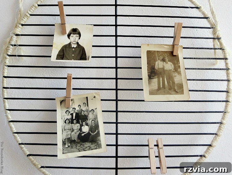 Craft a Heartfelt Photo Display for Dad 7 A collection of cherished family photos proudly displayed on the repurposed grill rack