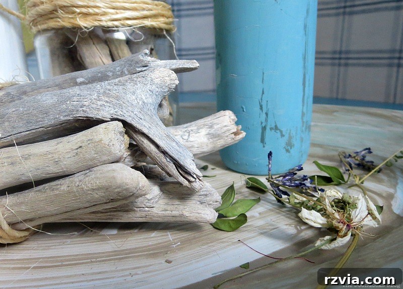 Detail shot of driftwood used in the beachy vignette, enhancing the coastal theme of the Greek Beach Table on theboodocksblog.com
