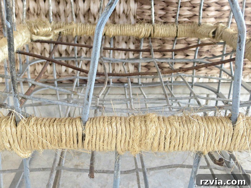 Beyond the Box: Milk Crate Table Reinvention 12 Close up of the twine securely binding the two upcycled wire crates together, showcasing the intricate and decorative detail of the lashing.