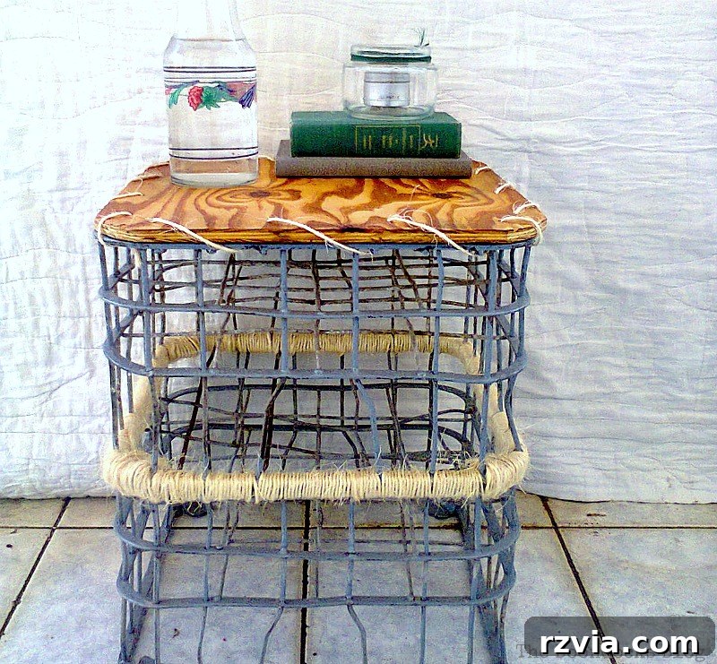 Beyond the Box: Milk Crate Table Reinvention 3 The wire milk crate table before the upcycle, showing its original rustic condition with an unpainted wooden top and weathered metal crates.