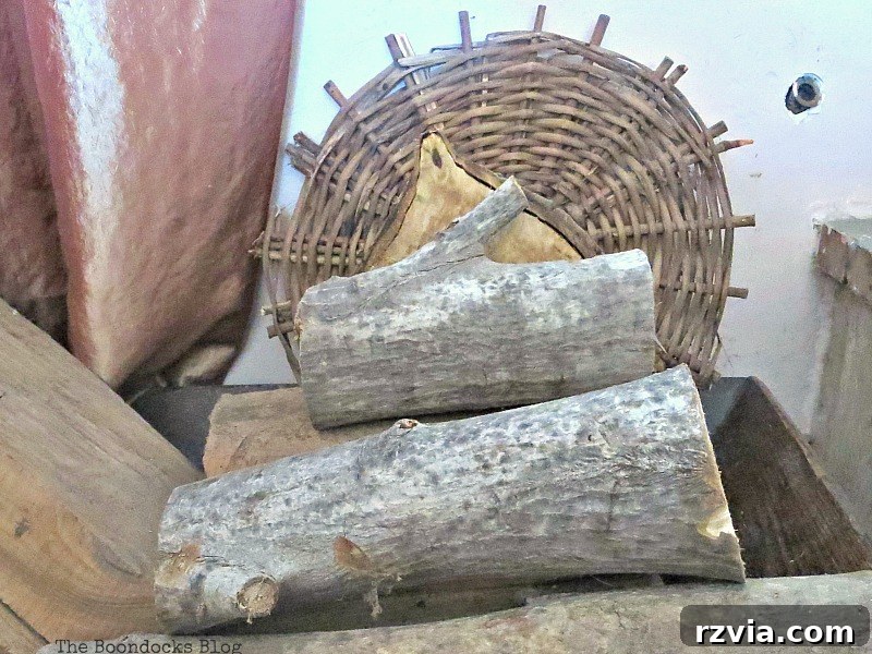 The wicker basket bottom placed next to a wooden washtub, ready for painting.