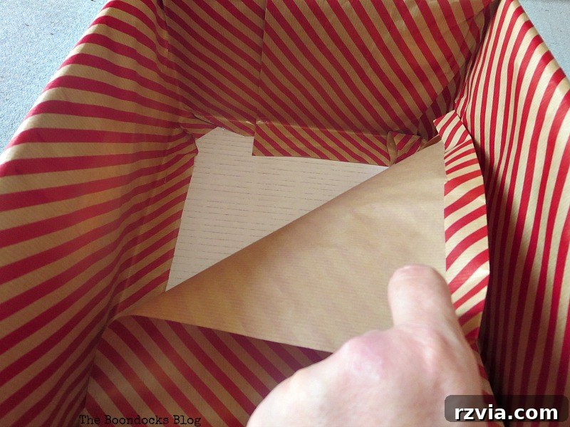 The bottom of Pretty Boxes for Organizing Clothes in the Closet www.theboondocksblog.com