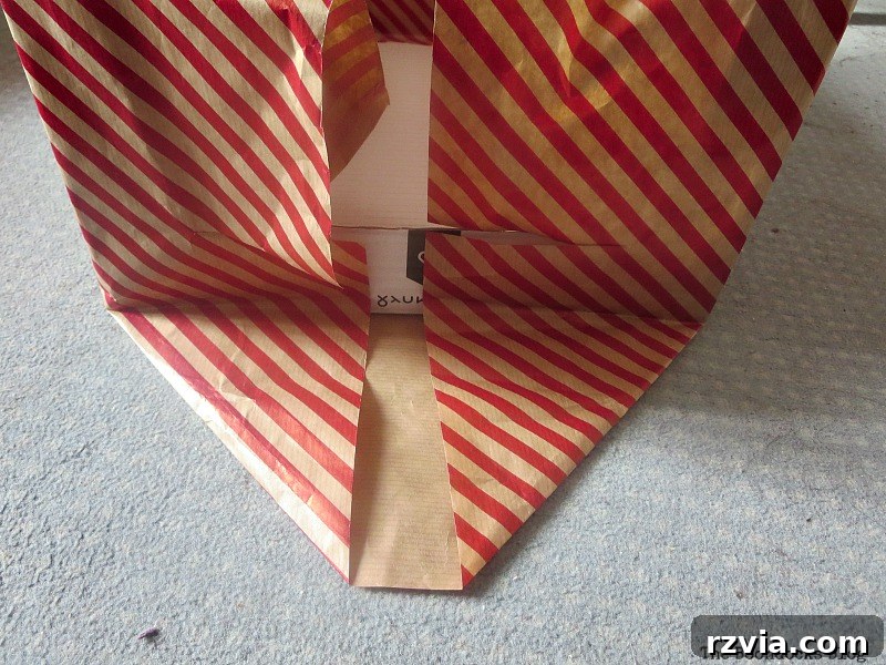 Folding paper as in gift wrap Pretty Boxes for Organizing Clothes in the Closet www.theboondocksblog.com