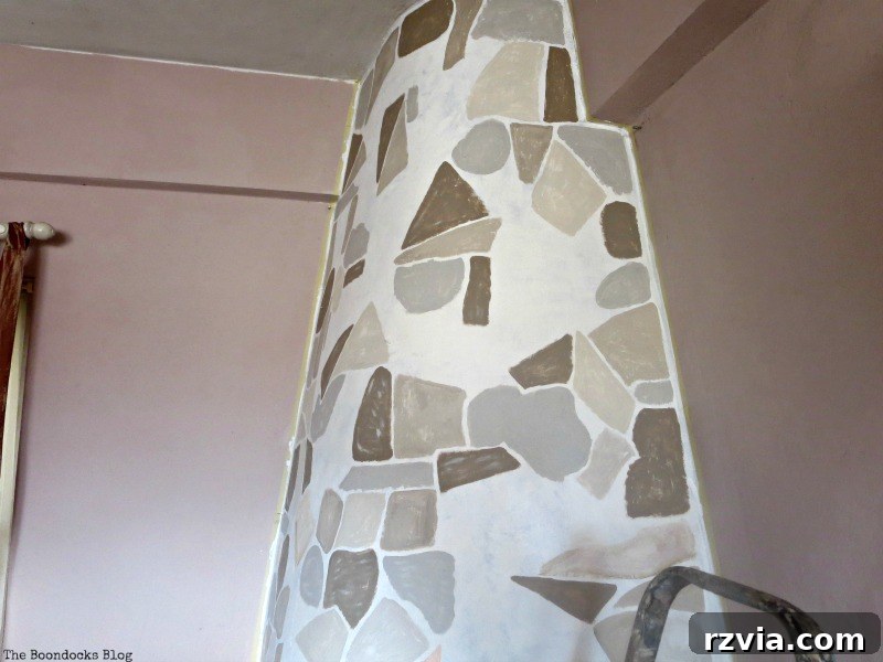 Igniting Style Our Fireplace's Bold Transformation 5 Painting the stones on the fireplace , The Long Overdue Fireplace makeover www.theboondocksblog.com