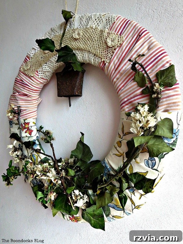 Fresh greenery and blooming almond branches gathered from a personal garden, ready to be incorporated into a beautiful DIY spring wreath.