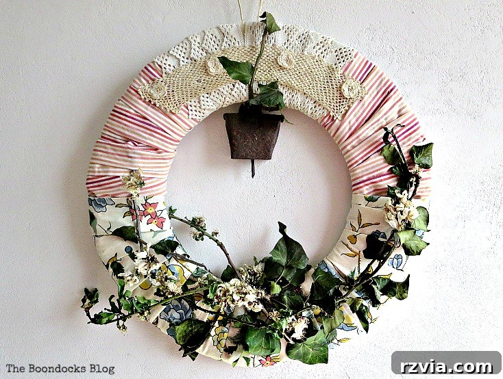 A beautiful handmade almond wreath for spring, featuring delicate blossoms and natural elements, showcasing a perfect blend of rustic and elegant DIY home decor.