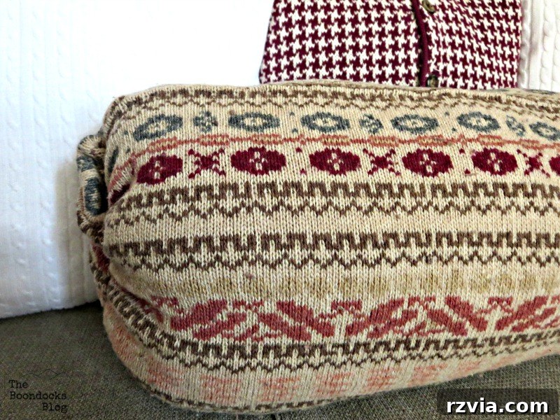 Quick & Cozy: DIY Sweater Pillows 15 A detailed close-up of a finished DIY sweater pillow, highlighting its soft texture and handcrafted charm.