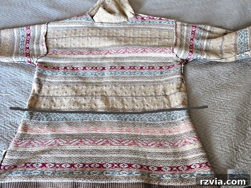 Quick & Cozy: DIY Sweater Pillows 6 Inside-out patterned sweater showing the stitch line across, about two-thirds down, defining the size of the DIY sweater pillow.