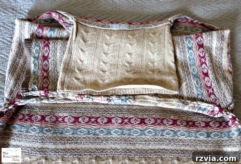Quick & Cozy: DIY Sweater Pillows 8 The cowl neck of a sweater being folded inward towards the main body, ensuring all fabric is contained for the DIY sweater pillow.