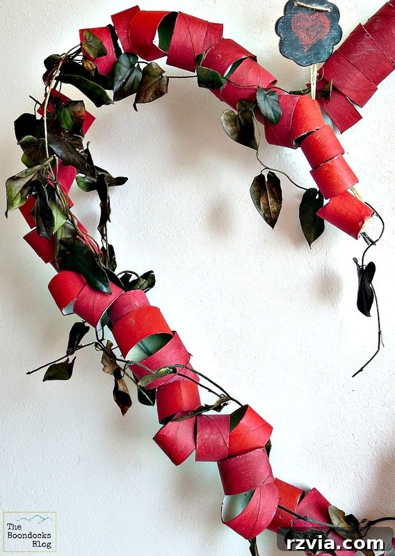 A wide shot showcasing the substantial size and bold statement of the upcycled heart wreath as a prominent piece of wall decor.