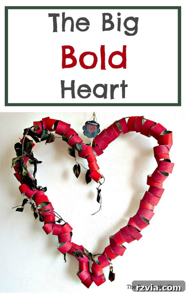 A budget-friendly splash of red and whimsy for Valentine's decorating: a Big, Bold Heart craft made from upcycled toilet paper rolls. Perfect for sustainable home decor.