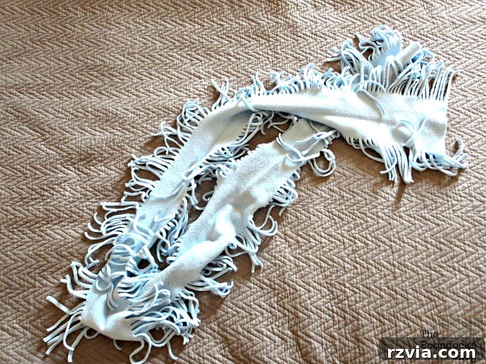 Effortless Fleece Pillow 3 Long fringed fleece scarf before transformation into a DIY pillow