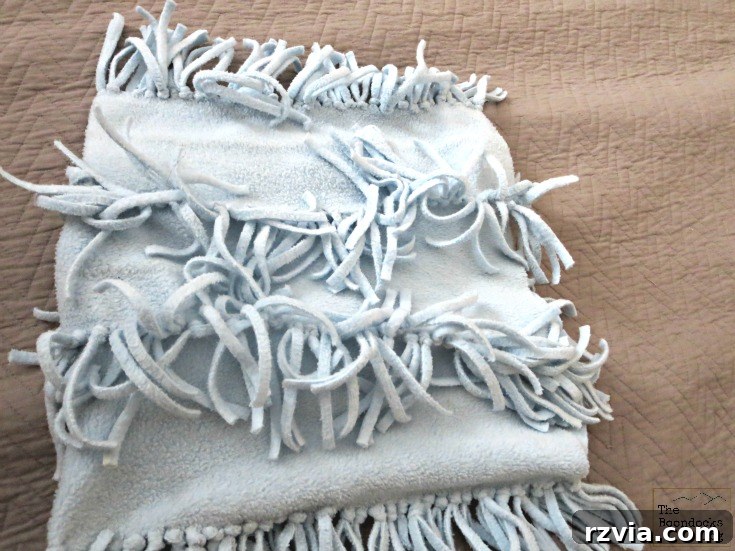 Effortless Fleece Pillow 9 The fleece scarf folded and tied, forming a pocket for the pillow insert