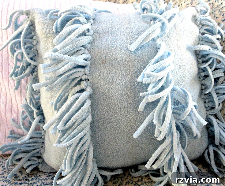 Effortless Fleece Pillow 11 Finished almost no-sew fleece pillow made from an upcycled scarf