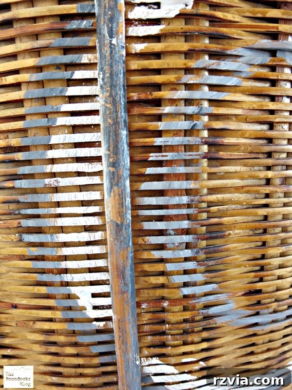 Intricate close-up detail of the front of the painted basket, highlighting the unique circle design and texture
