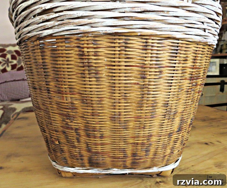 Top and bottom reeds of the wicker basket painted white as the base coat for a DIY project