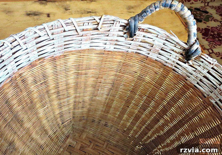 Inside top edge of the wicker basket painted white for a clean, finished appearance