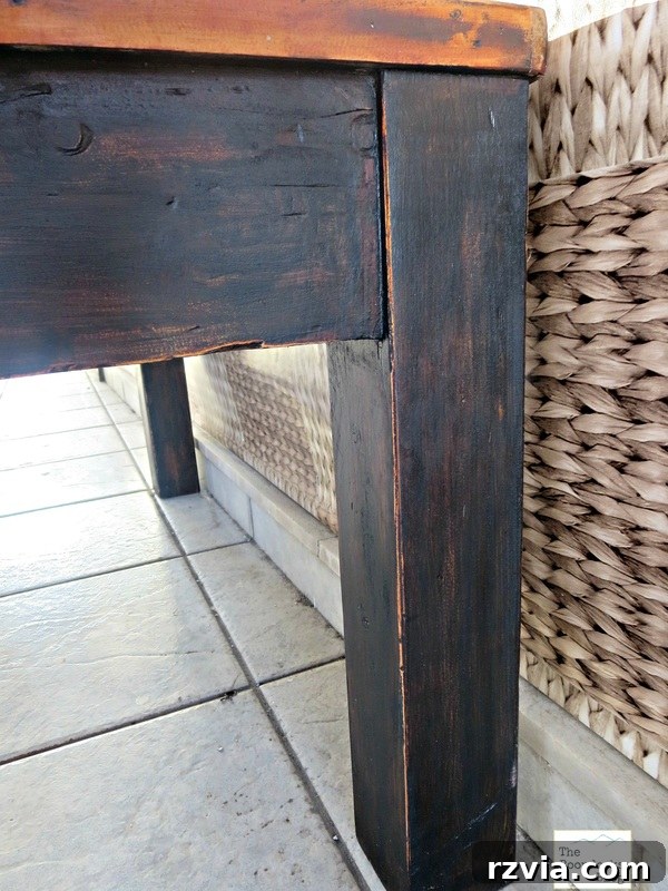 Vibrant Tri-Tone Reclaimed Coffee Table 13 Detail shot of the blonde coffee table top, showcasing its smooth finish and rich texture.