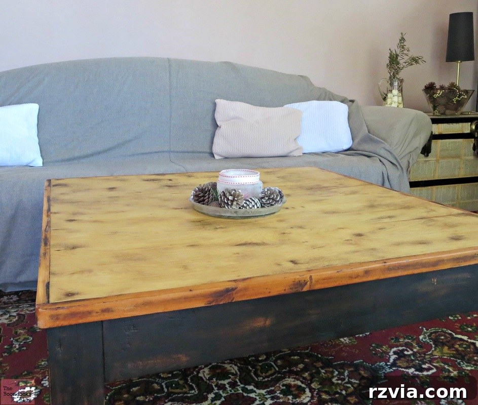 Vibrant Tri-Tone Reclaimed Coffee Table 14 The refurbished tri-colored coffee table placed elegantly in a living room setting, complementing the decor.