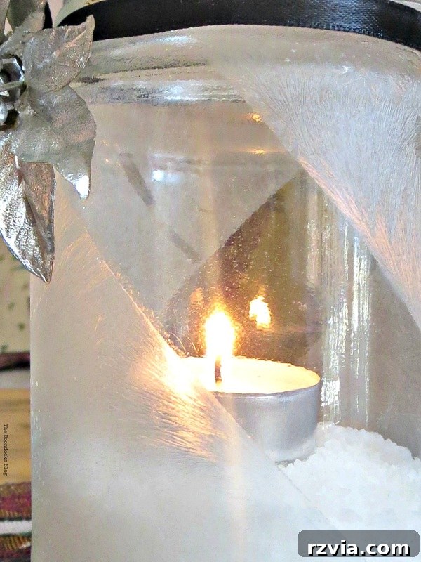 Phantom Snow 11 Lit tealight holder with crystal ice spray and elegant silver flower decoration