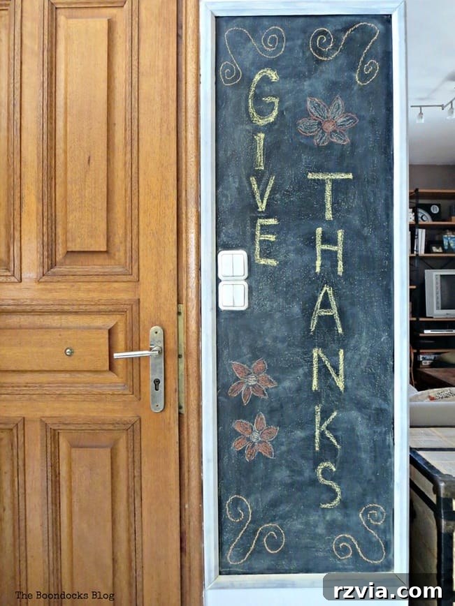Craft Your Custom Chalkboard Wall 14 Beautifully transformed blackboard wall with its elegant frame, showcasing the completed DIY project. www.theboondocksblog.com