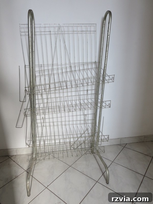An old wire display rack before repurposing, ready for a creative DIY transformation. The Twine Lady Returns www.theboondocksblog.com