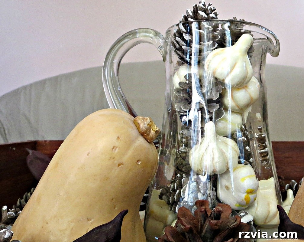 Real and faux pumpkins in a fall vignette, www.theboondocksblog.com