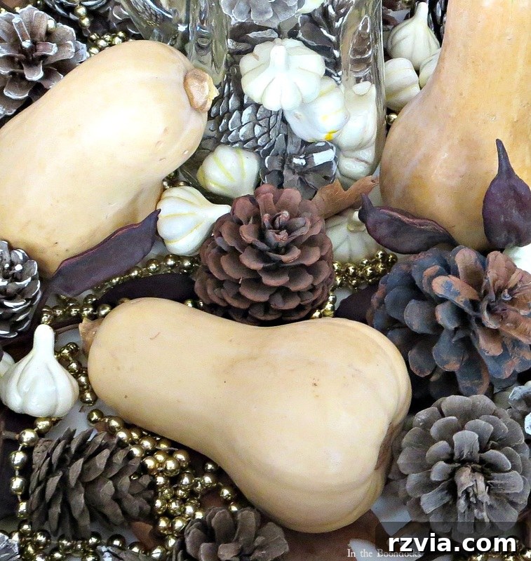 Gold garlands adding sparkle to a fall vignette, www.theboondocksblog.com