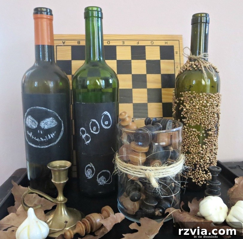 3 bottles painted with chalkboard paint, The Chalkboard Fall Vignette www.theboondocksblog.com