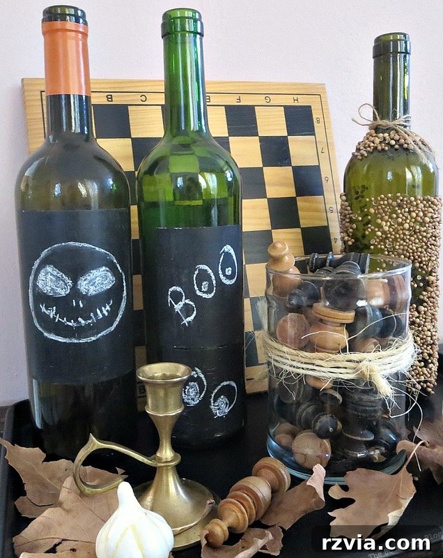 Painting bottle labels chalkboard paint to write or draw messages on the bottles, The Chalkboard Fall Vignette www.theboondocksblog.com